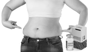 Woman with fat belly on  background.